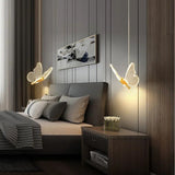 Pendant light in the shape of a butterfly